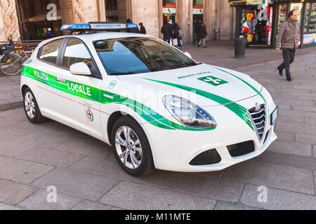 Milano, Italy - January 19, 2018: Alfa Romeo Giulietta, Italian police car patrols Piazza del Duomo, central city square of Milano Stock Photo