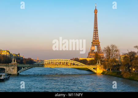 Sunset on Eiffel tower and Pont Rouelle - Paris, France Stock Photo