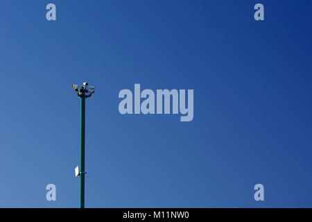Surveillance CCTV Crime Prevention Mast, against a Blue Sky. Aberdeen Beach Boulevard, Scotland, UK. Stock Photo