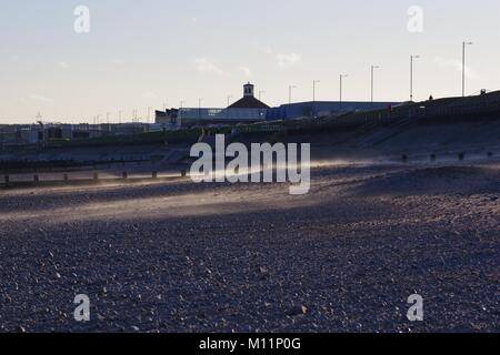 Aberdeen Beach Ballroom, and Promenade, Wind Blown Sand across Pebble Beach. Scotland, UK. January, 2018. Stock Photo