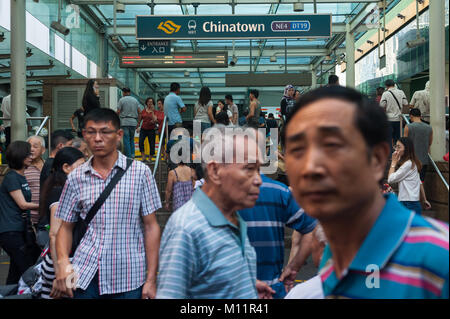 21.01.2018, Singapore, Republic of Singapore, Asia - People are bustling in front of an entrance to the Chinatown MRT station. Stock Photo