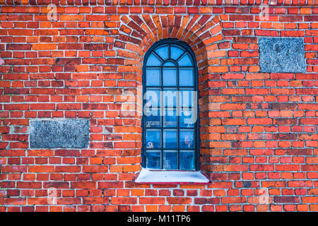 Old red brick wall texture background image with window inside Stock Photo