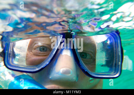 Mexico. Yucatan peninsula. Man wearing snorkeling mask in water. Stock Photo