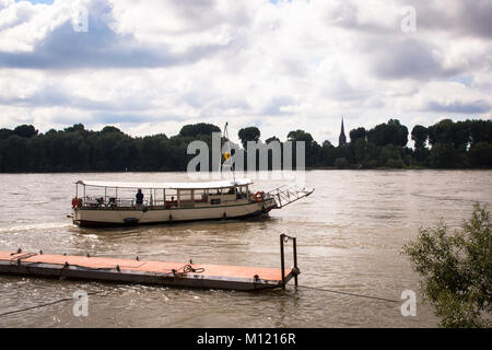 Germany, Cologne, river Rhine, ferry boat for bicycle drivers and walkers between the district Weiss and Porz-Zuendorf.  Deutschland, Koeln, Rhein, Fa Stock Photo