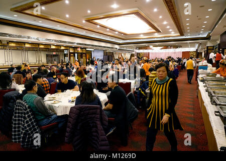 Dim sum carts rolled out in crowded Jing Fong Chinese restaurant in Chinatown.Manhattan.New York City.USA Stock Photo