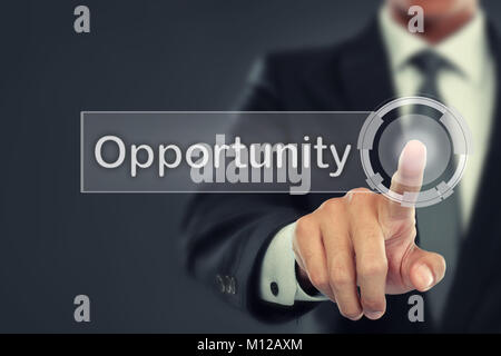 portrait of Businessman push to  Opportunity button on virtual screen Stock Photo