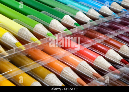 Trays of new coloured pencils Stock Photo