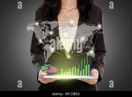 Portrait of Business woman with tablet PC showing success global business concept Stock Photo