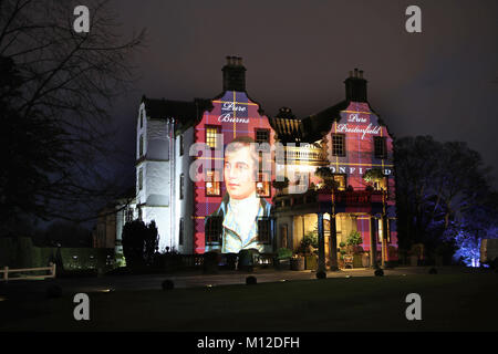 A portrait of Robert Burns is projected on to the front of Prestonfield House in Edinburgh on Burns Night. Stock Photo