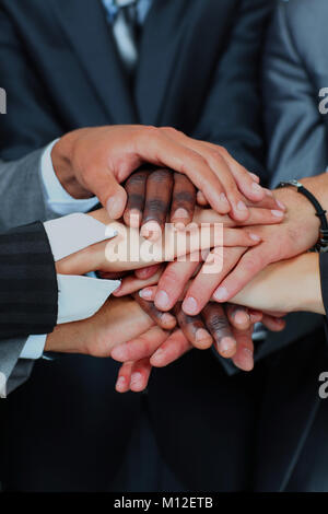 Team work concept. Business people joining hands. Stock Photo