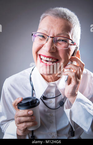 Modern elderly business woman Stock Photo