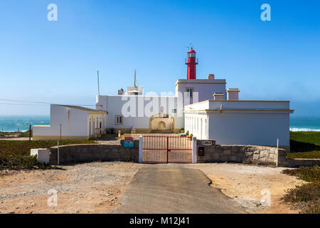 Cabo Raso Lighthouse is a cylindrical, red, metallic tower, thirteen meters high, with a lantern and balcony located in the Fort of Sao Bras of Sanxet Stock Photo