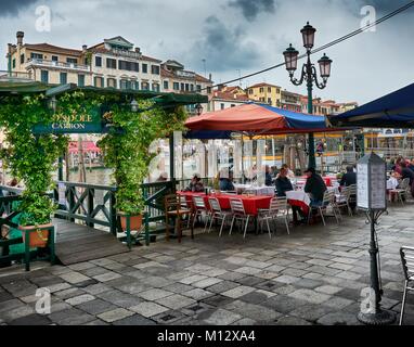 VENICE, ITALY - MAY 20, 2017: Gondola stand with some beautiful buildings behind in the Grand Canal in Venice, Italy. Stock Photo
