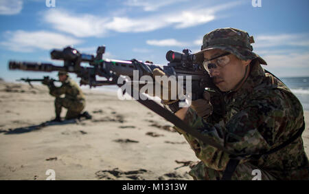 MARINE CORPS BASE CAMP PENDLETON, Calif. – Japan Ground Self Defense Force Soldiers with the Western Army Infantry Regiment, set up a 360 degree perimeter security position during exercise Iron Fist 2018, Jan. 24. Iron Fist is an annual, bilateral training exercise where U.S. and Japanese service members train together and share techniques, tactics and procedures to improve their combined operational capabilities. (U.S. Marine Corps photo by Cpl. Jacob A. Farbo) Stock Photo