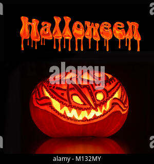 Illuminated Halloween Jack-o-lantern pumpkin, black background Stock Photo