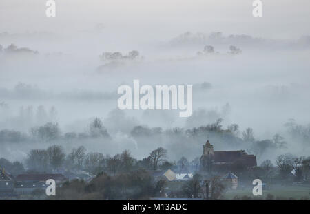 Firle, East Sussex. 26th January 2018. Morning mist in the South Downs National Park, near Firle, East Sussex, on a bright but cold day in the South Credit:  Peter Cripps/Alamy Live News Stock Photo