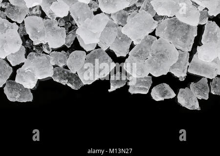 crushed ice cube texture on black background Stock Photo