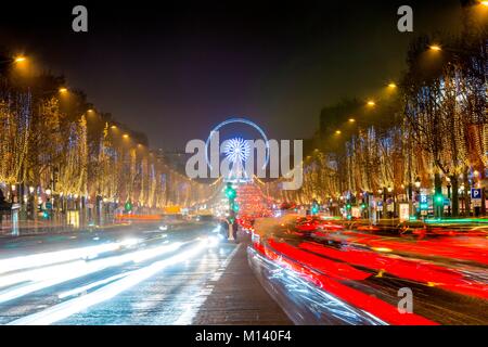 France, Paris, the Champs Elysees and the Grande Roue during the Christmas holidays Stock Photo