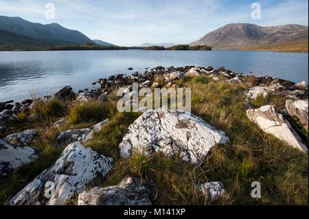 Ireland, County Galway, Connemara National Park, Inagh Lake, Twelve Bens Mountains left, Maumturk Mountains right Stock Photo
