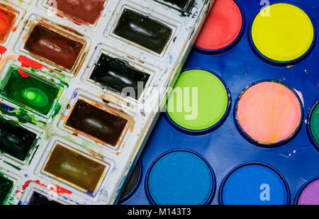 creative background from the sets of bright paints watercolors of various Stock Photo