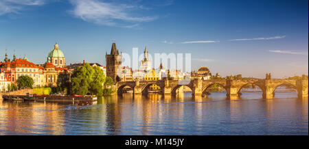 View of the Vltava River and the bridges shined with the sunset sun, Prague, the Czech Republic Stock Photo