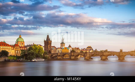 View of the Vltava River and the bridges shined with the sunset sun, Prague, the Czech Republic Stock Photo