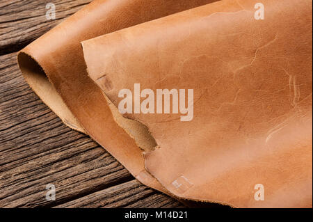 leather working, closeup details of brown leather Stock Photo