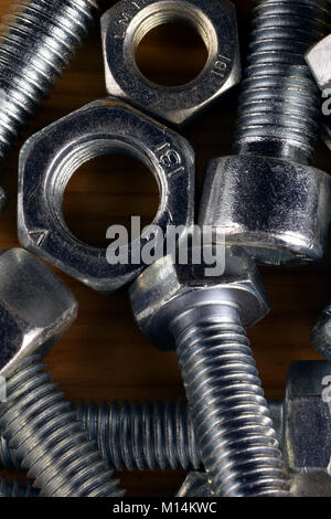 Bolts and nuts, vertical close up image Stock Photo