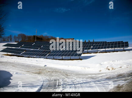 Solar panels in a rural area in Vermont Stock Photo