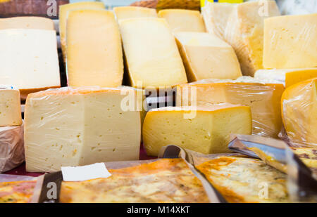 Cheese collection in grocery, close up shot Stock Photo