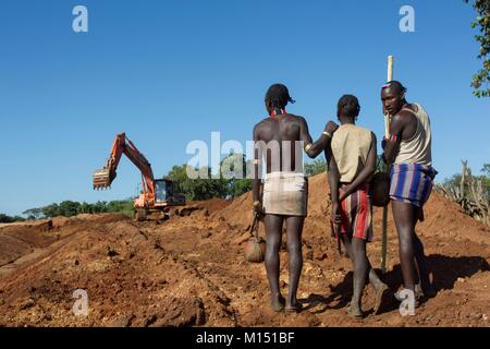 Ethiopia, Lower Omo Valley listed as World Heritage by UNESCO, Hamer tribe, Hamsmen watch build a road that will cross their territory Stock Photo