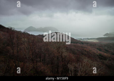 Panoramic views over Lake Toya from Mount. Usu Ropeway. The ropeway opened in 1965, and climbs Mount Usu, the active volcano in Shikotsu-Toya. Stock Photo