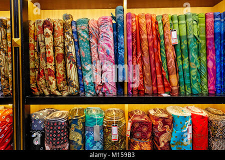 Selection of batik fabrics for sale in Hamzah Batik shop. Yogyakarta, Java, Indonesia. Stock Photo