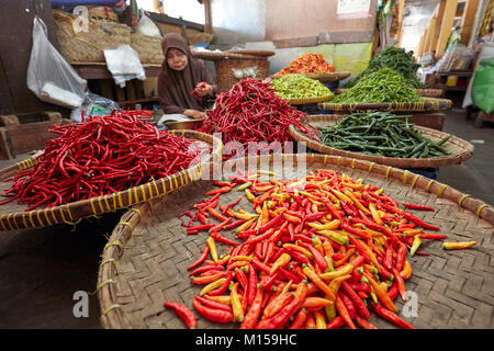 A selection of chili peppers for sale in the Beringharjo Market (Pasar Beringharjo). Yogyakarta, Java, Indonesia. Stock Photo