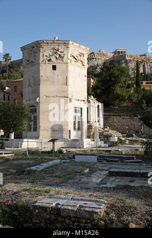 The Tower of the Winds or the Horologion of Andronikos Kyrrhestes with the Acropolis behind, Athens, Greece, Europe Stock Photo