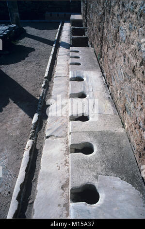 Ancient roman latrine public toilets at Ephesus in Turkey Stock Photo ...