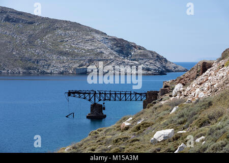 Rusty remains of old mining pier at Koutalas bay on island's south east coast, Serifos, Cyclades, Aegean Sea, Greek Islands, Greece, Europe Stock Photo