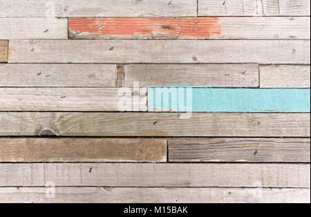 Part ow old wooden panel with blue and orange timbers Stock Photo
