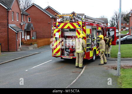 Fire Brigade attending a skip fire in North Wales Stock Photo - Alamy