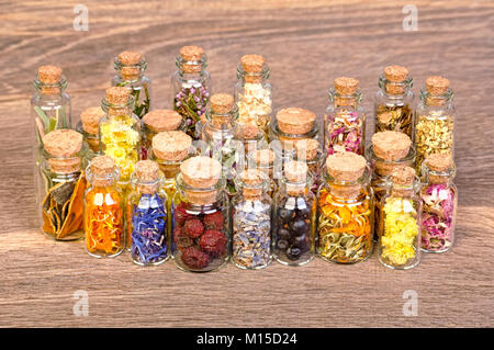 Bottles with herbs used in non- traditional medicine. Stock Photo