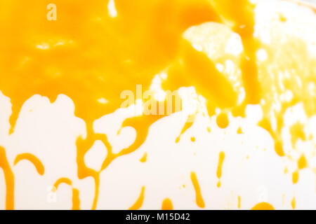 Orange jam on white background. Abstract image. Stock Photo