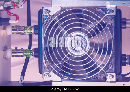 cooling system heat exchanger fragment with focus on fan Stock Photo