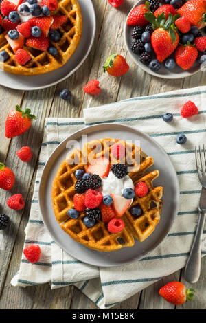 Sweet Homemade Berry Belgian Waffle with Whipped Cream Stock Photo