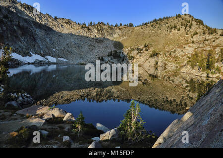 Reflection of mountains on Echo Lake in the Eagle Cap Wilderness in Eastern Oregon. Stock Photo