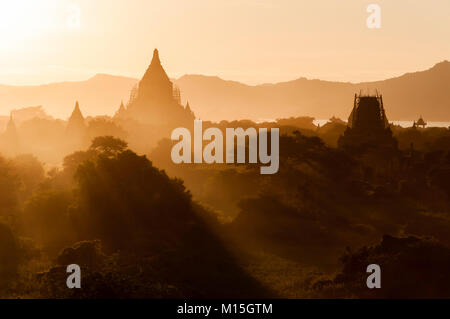 BAGAN, MYANMAR - NOVEMBER, 2016: Bagan, also spelled Pagan, on the banks of the Ayerwaddy River, is home to the largest area of Buddhist temples, pago Stock Photo