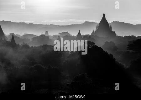 BAGAN, MYANMAR - NOVEMBER, 2016: Bagan, also spelled Pagan, on the banks of the Ayerwaddy River, is home to the largest area of Buddhist temples, pago Stock Photo