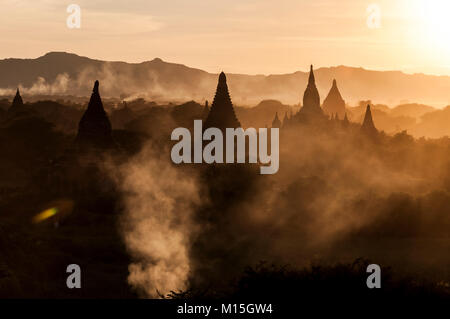 BAGAN, MYANMAR - NOVEMBER, 2016: Bagan, also spelled Pagan, on the banks of the Ayerwaddy River, is home to the largest area of Buddhist temples, pago Stock Photo