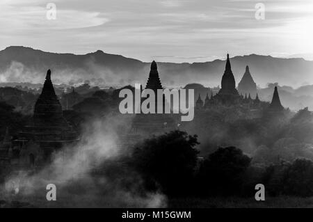 BAGAN, MYANMAR - NOVEMBER, 2016: Bagan, also spelled Pagan, on the banks of the Ayerwaddy River, is home to the largest area of Buddhist temples, pago Stock Photo