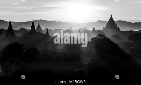 BAGAN, MYANMAR - NOVEMBER, 2016: Bagan, also spelled Pagan, on the banks of the Ayerwaddy River, is home to the largest area of Buddhist temples, pago Stock Photo