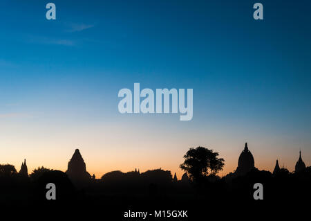 BAGAN, MYANMAR - NOVEMBER, 2016: Bagan, also spelled Pagan, on the banks of the Ayerwaddy River, is home to the largest area of Buddhist temples, pago Stock Photo